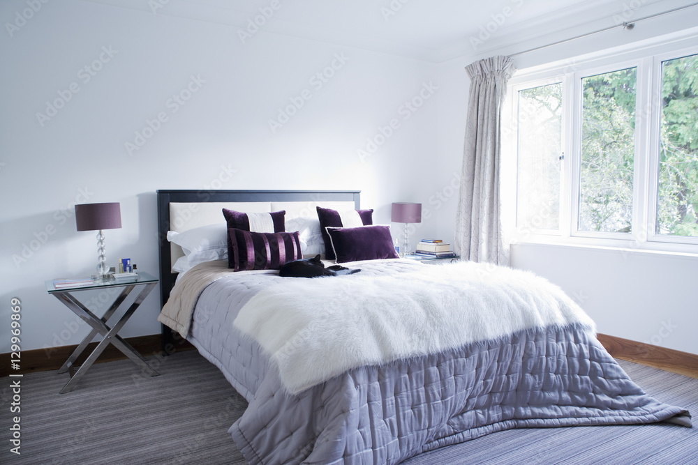 Obraz premium View of a spacious and tidy bedroom