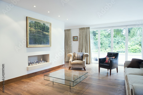 Photography Modern and spacious living room with porch view