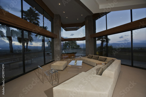 Luxury interior shot of lounge room with dusk view © moodboard