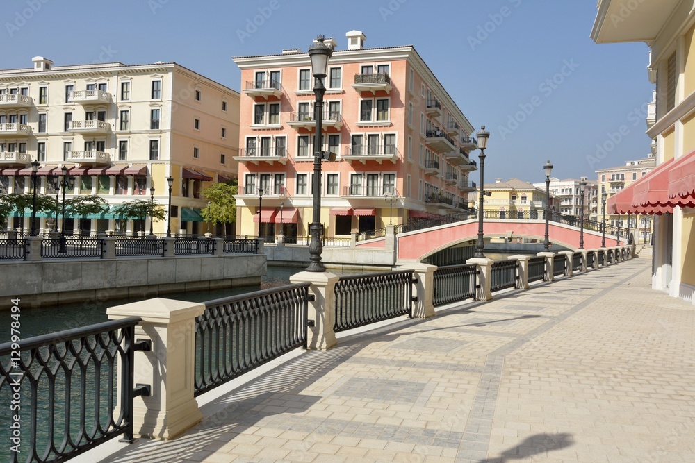 Obraz premium Canal view in Venice-like Qanat Quartier of the Pearl precinct of Doha, Qatar.