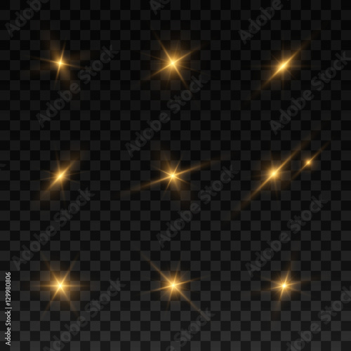 Glowing lights and stars on black background.
