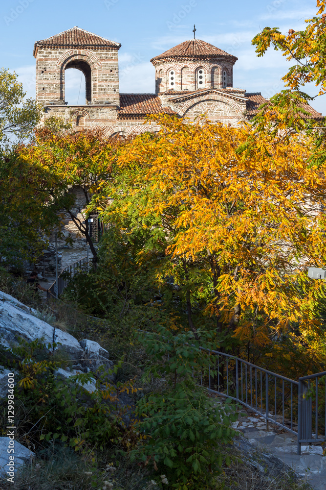 Obraz premium Yellow trees and Church of the Holy Mother of God in Asen's Fortress, Asenovgrad, Plovdiv Region, Bulgaria