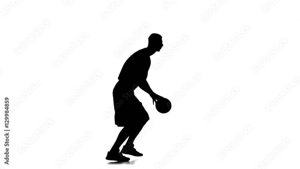 Basketball is a ball and stuffing his hands. Side view. White background Basketball is a ball and stuffing his hands. Side view. White background