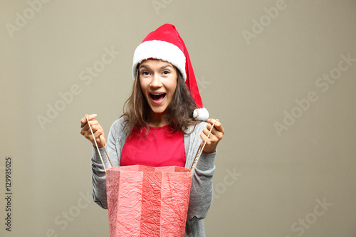 Young woman with bag for Ch...