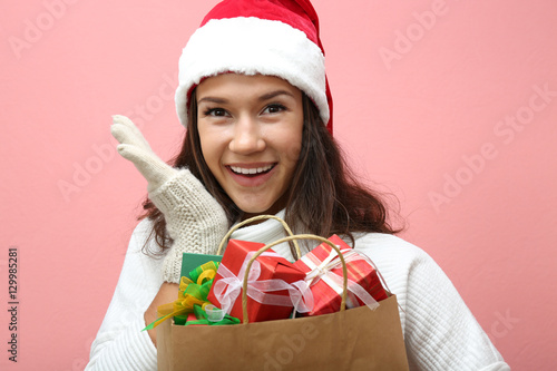 Young woman holding shoppin...