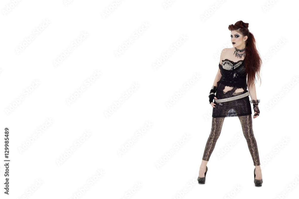 Portrait of beautiful young punk woman posing over white background Portrait of beautiful young punk woman posing over white background