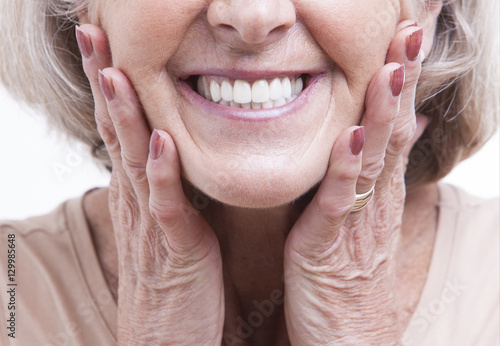 Close up view on senior dentures photo