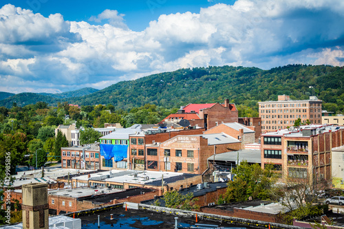 View of buildings in downtown and Town Mountain, in Asheville, N © jonbilous