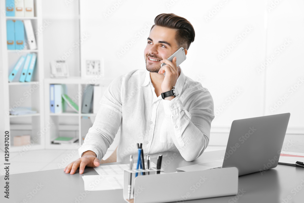 Handsome man working in office Handsome man working in office