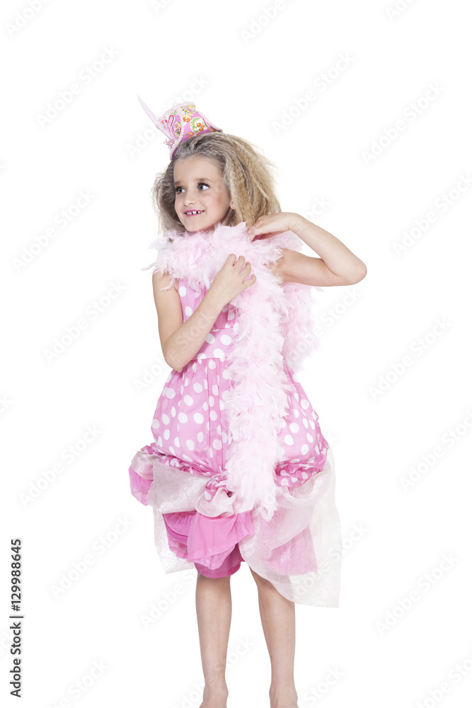 Happy bridesmaid standing while looking away over white background Happy bridesmaid standing while looking away over white background
