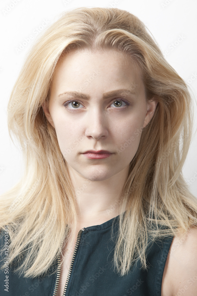 Portrait of young Caucasian woman against white background Portrait of young Caucasian woman against white background