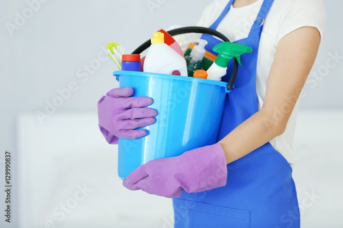 Close up view of woman with cleaning supplies at home © Africa Studio