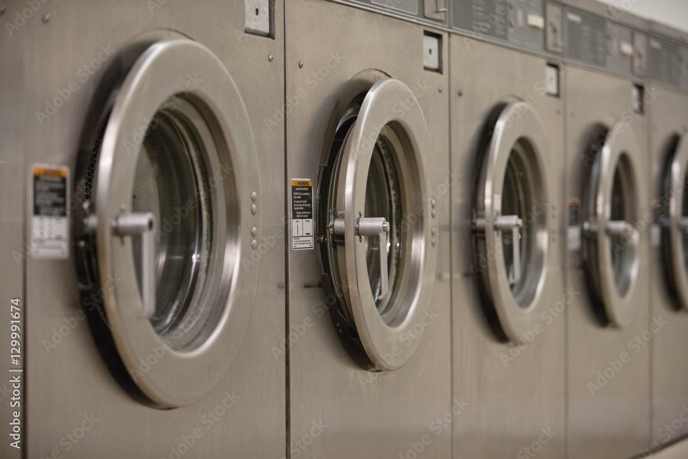 Row of self-service clothes dryer's door Row of self-service clothes dryer's door