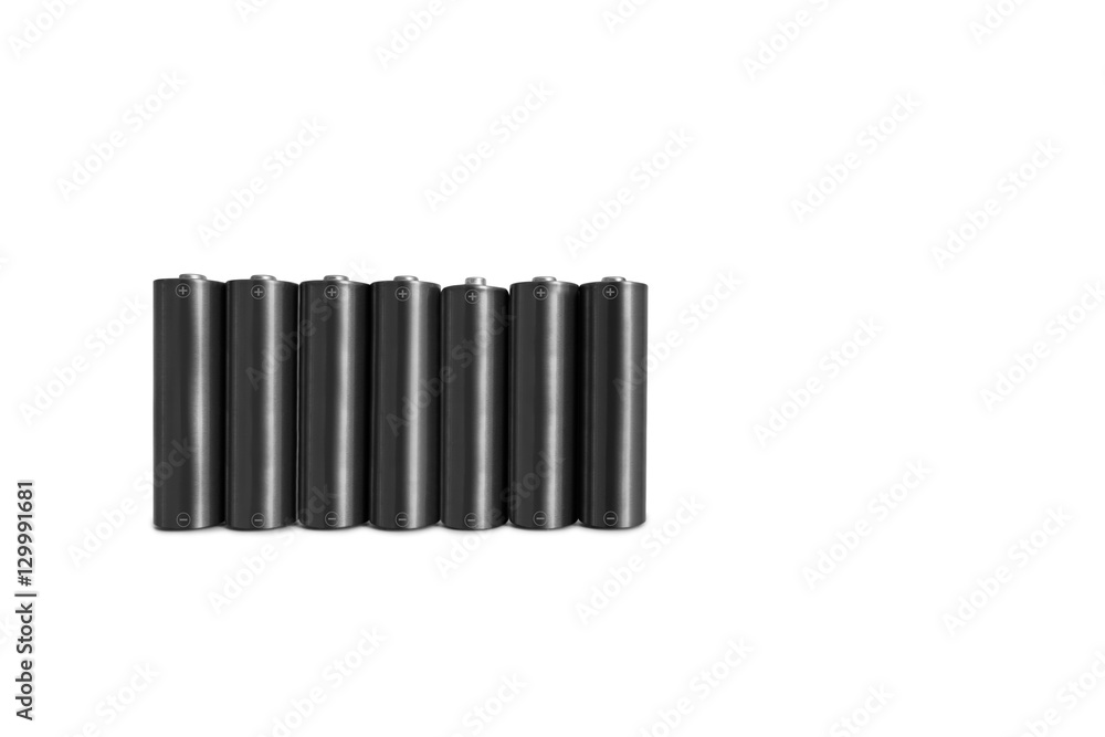 Close-up of black batteries over white background