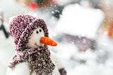 Cute Happy Smiling Snowman Wearing Winter Scarf and Hat