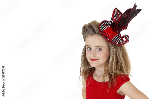 Portrait of school girl wearing headgear over white background