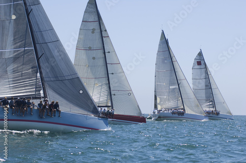 View of four yachts competing in team sailing event