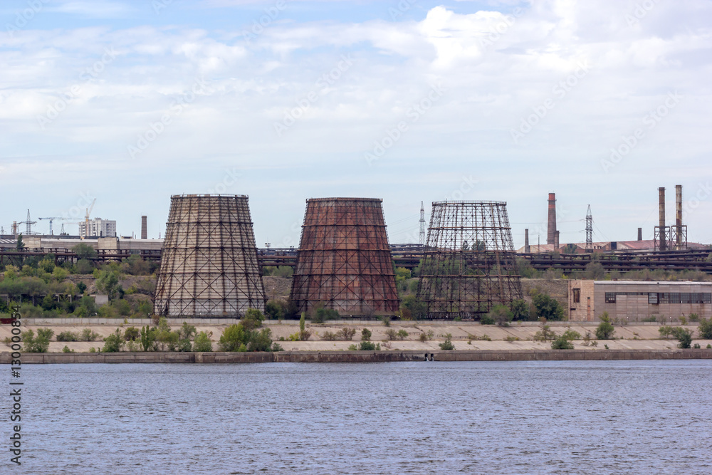 Panoramic view of ironworks on river coastline