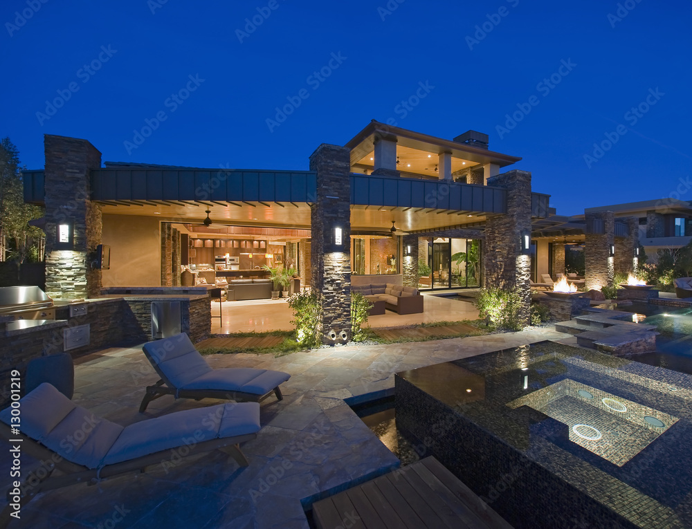 Exterior of contemporary house with plunge pool at dusk - obrazy, fototapety, plakaty 
