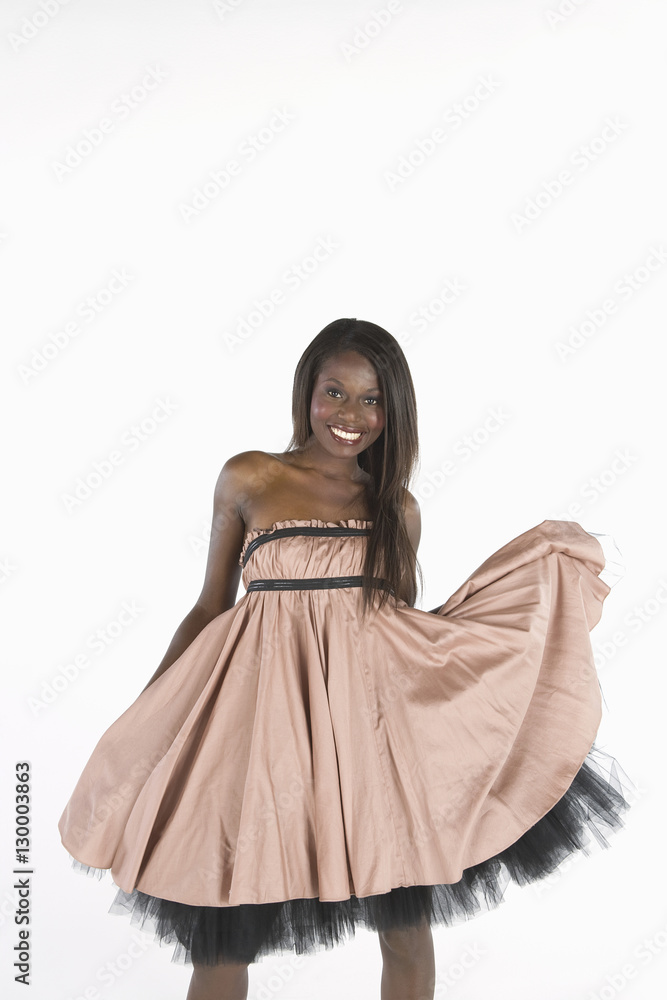 Portrait of an African American fashion model isolated over white background