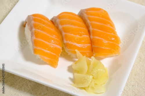 Salmon Sushi with pickled ginger.