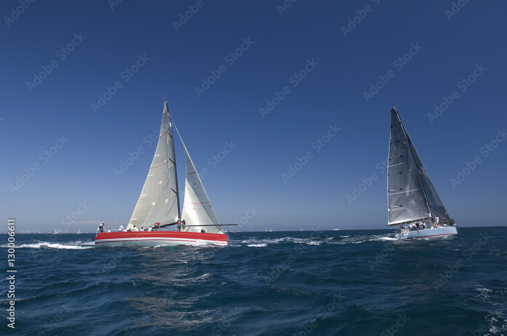 Fototapeta premium View of two yachts competing in team sailing event