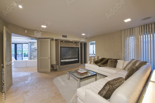 View of a modern and spacious television area at home
