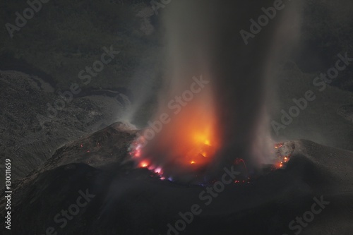 Molten lava glows in volcanic crater of Santiaguito Santa Maria Guatemala