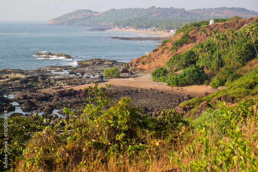 Waves break on the rocky beaches of Arambol in India. Waves break on the rocky beaches of Arambol in India.