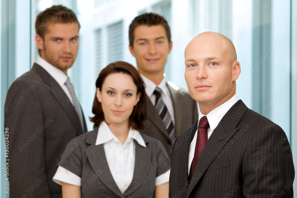 Portrait of young caucasian business people in office Portrait of young caucasian business people in office