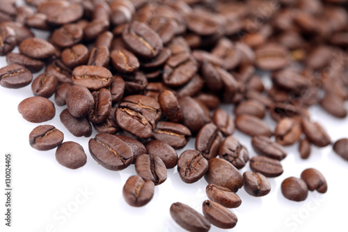 Rosted coffee grains on white backgorund