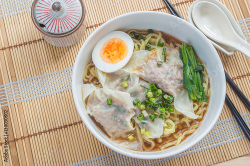 Womton ramen is a Japanese dish consisting of Asian wheat noodles laded with broth and topped with stuffed dumpling..