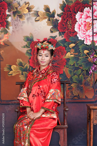 Asia   Chinese girl in red traditional dress