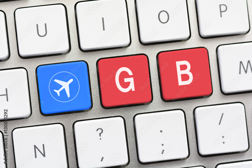 GB writing on white keyboard with a aircraft sketch GB writing on white keyboard with a aircraft sketch