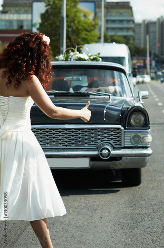 bride stops the car at a wedding © Dmitriy Shipilov