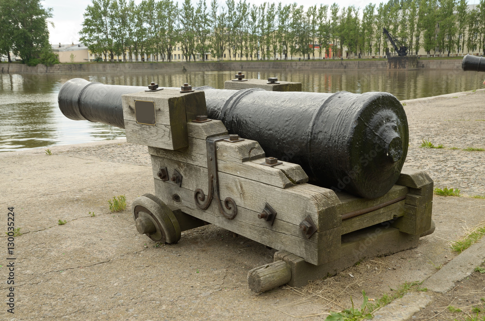 Old cannon on the shore.