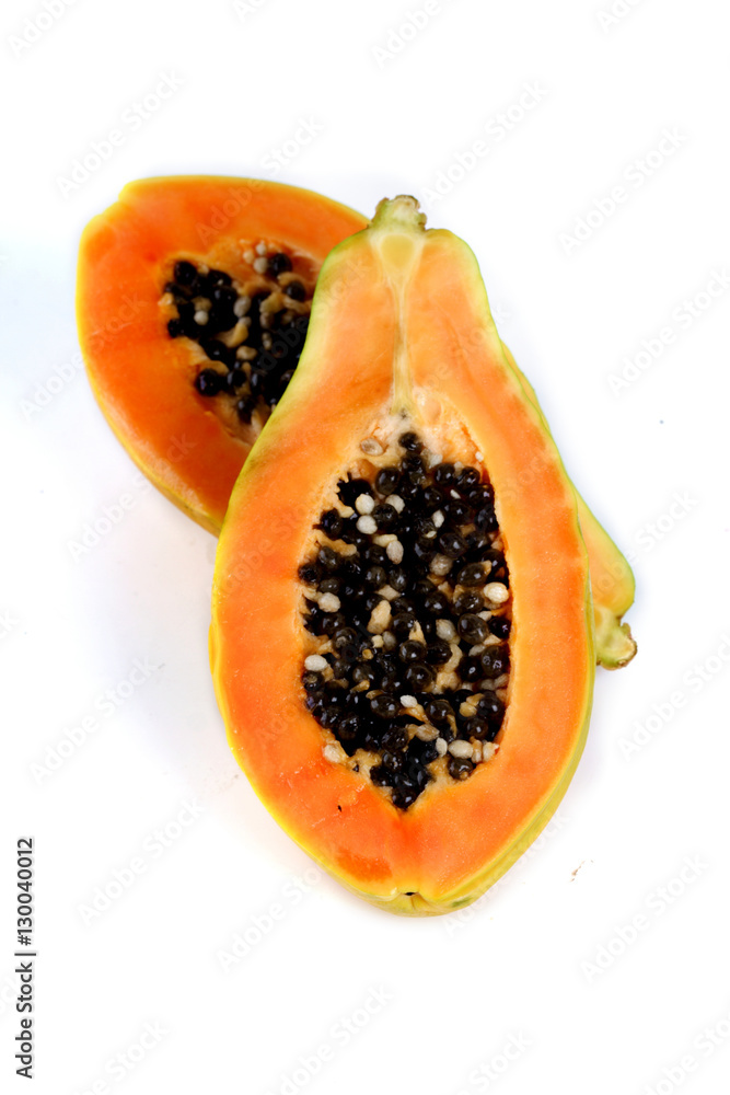 Papaya on white backgrouns - studio shot Papaya on white backgrouns - studio shot