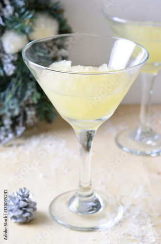 Lemon Slush Cocktail on bright festive winter background