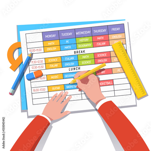 School teacher or student drawing a class schedule