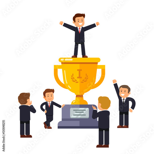 Leader standing on big winner golden cup