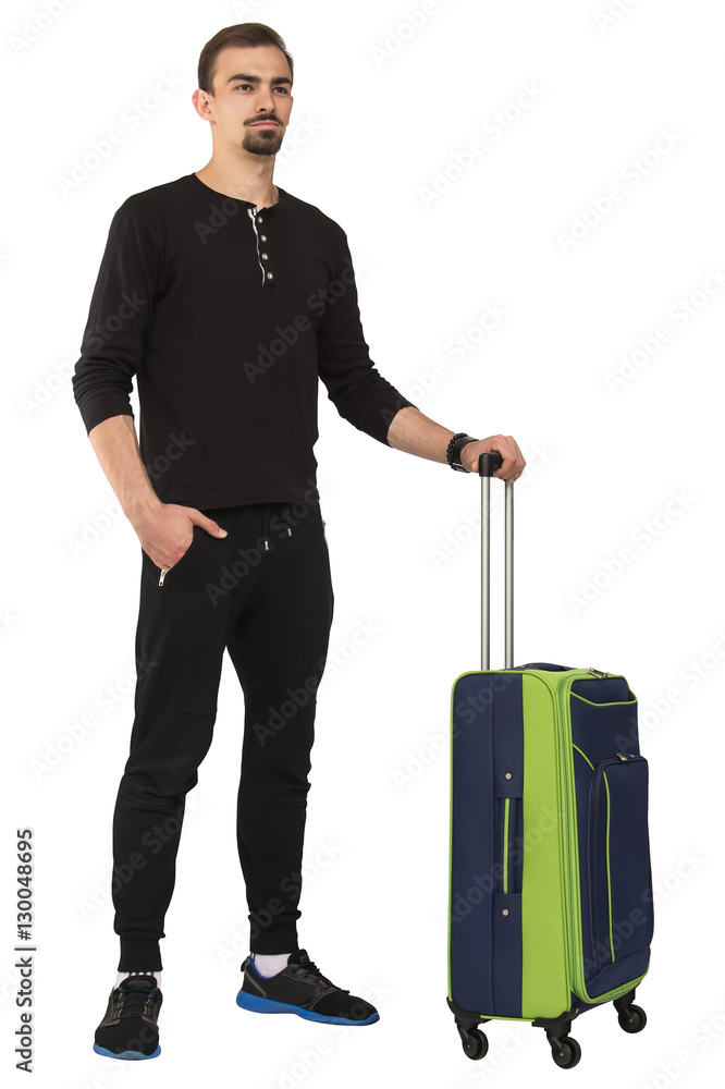 handsome man standing with green and blue suitcase isolated on white background handsome man standing with green and blue suitcase isolated on white background