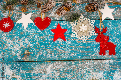 Christmas decoration hanging over wooden background