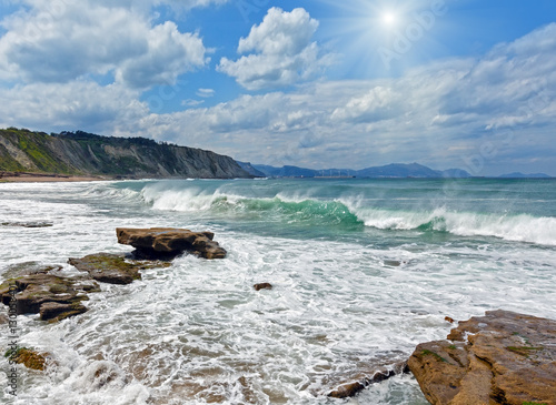 Beach Azkorri or Gorrondatxe sunshiny view. photo