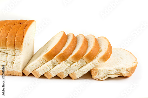 Loaf of whole grain bread isolated on white background