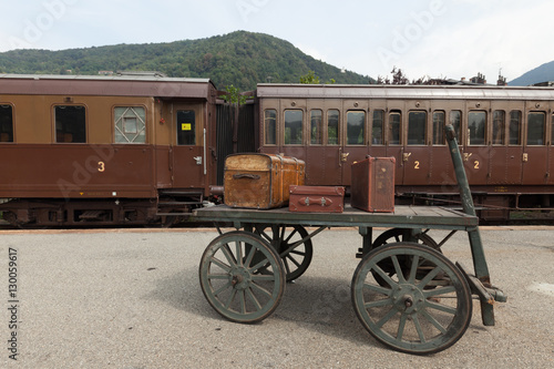 Old suitcases on railway platform