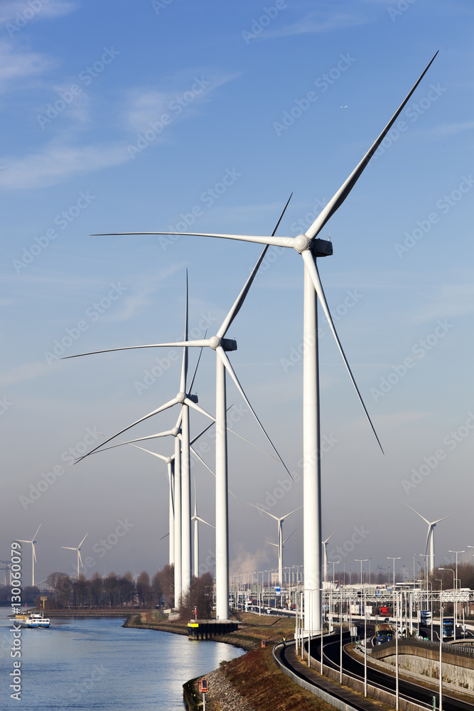 Wind turbines near canal Hartel in Rotterdam
