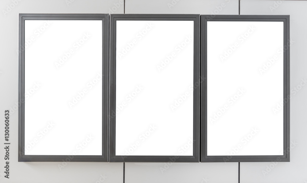 Three blank billboards display on modern wall for advertisement content Three blank billboards display on modern wall for advertisement content