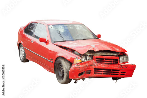 wrecked red car in accident