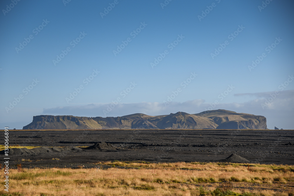 mountain landscape and black beach in Iceland