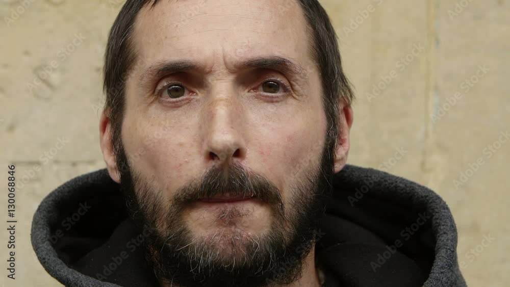 Close-up of an homeless begging for money on the street Close-up of an homeless begging for money on the street